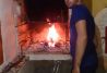 Salón común con barbacoa horno de leña